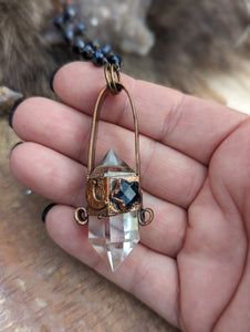 Clear Quartz Point Necklace with Iolite Star