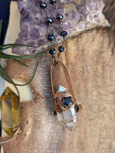 Clear Quartz Point Necklace with Iolite Star