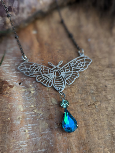 Moth Silvertone Necklace - Blue Drop