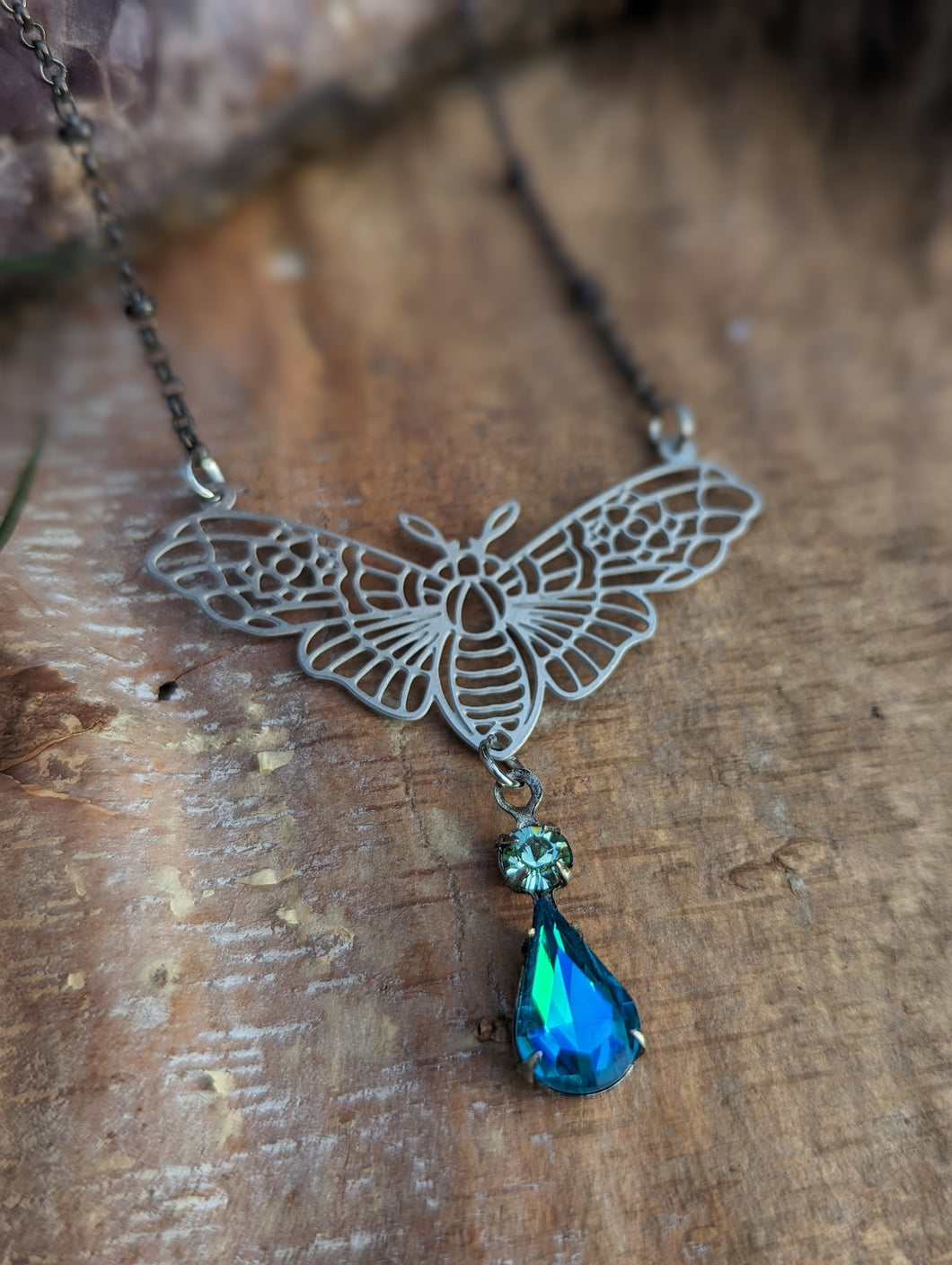 Moth Silvertone Necklace - Blue Drop