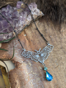 Moth Silvertone Necklace - Blue Drop