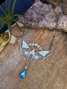 Moonphase Moth Silvertone Necklace - Blue Drop