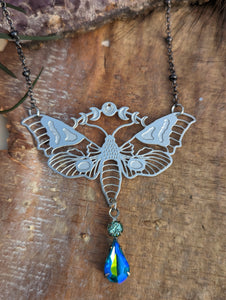 Moonphase Moth Silvertone Necklace - Blue Drop