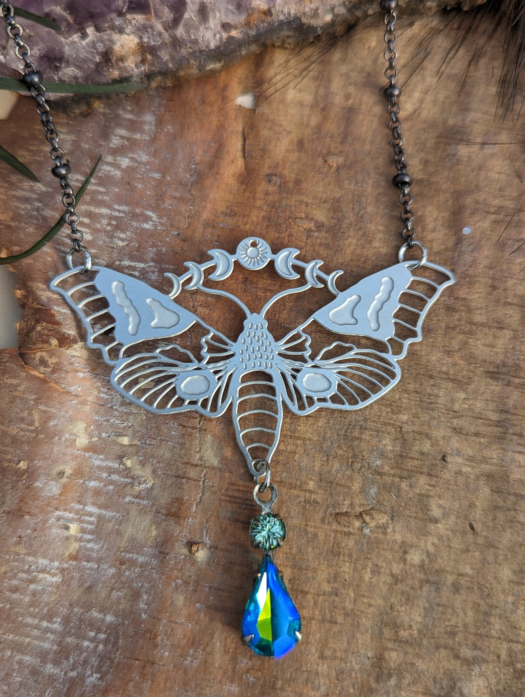 Moonphase Moth Silvertone Necklace - Blue Drop