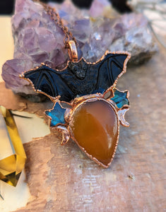 Carved Buffalo Horn Bat with Orange Onyx Necklace