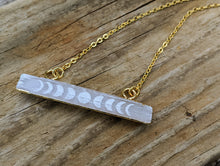 Load image into Gallery viewer, Engraved Selenite Moon Phase Necklace - Horizontal Bar - Minxes&#39; Trinkets