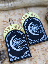 Load image into Gallery viewer, Acrylic Eye Earrings with Brass Moon Phase Crescents